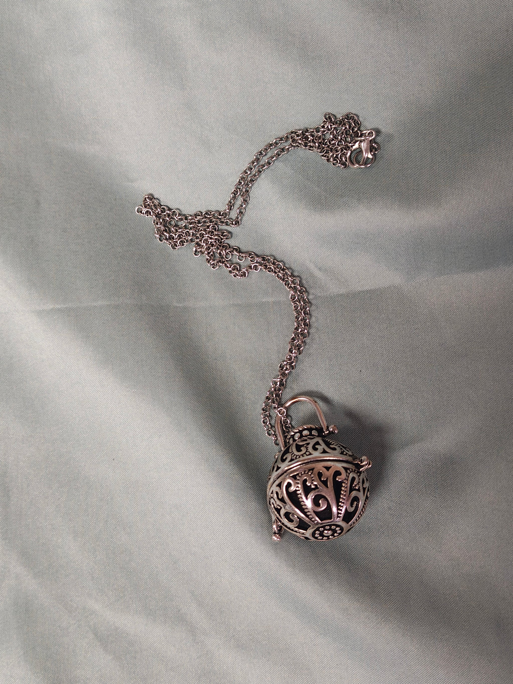 Silver ball cage necklace