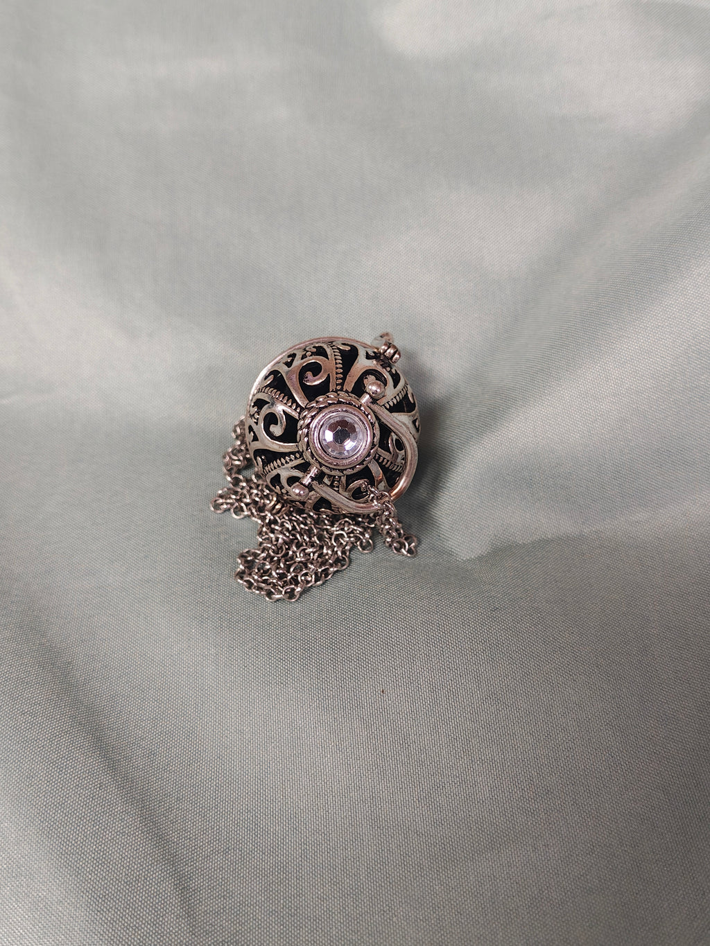 Silver ball cage necklace